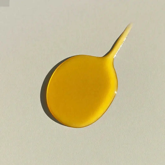 Bohemian Reves Radiance Serum - Luxurious Golden Elixir for Skin Radiance